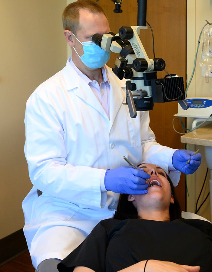 Doctor using Microscope Photo